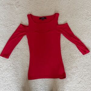 Guess Red Long sleeved shirt with shoulder cut out and cut out above chest.
